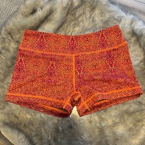 Orange textured short bike shorts